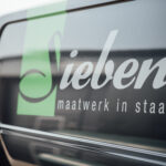 Nieuwe bus, Siebendesign, Autobelettering Eindhoven.nl, Fotonicolai.nl, Bestpoint productions, Maatwerk staal, Interieurbouw in staal, lassen, 3d cad, werkplaats, vakmanschap, Sieben design en techniek